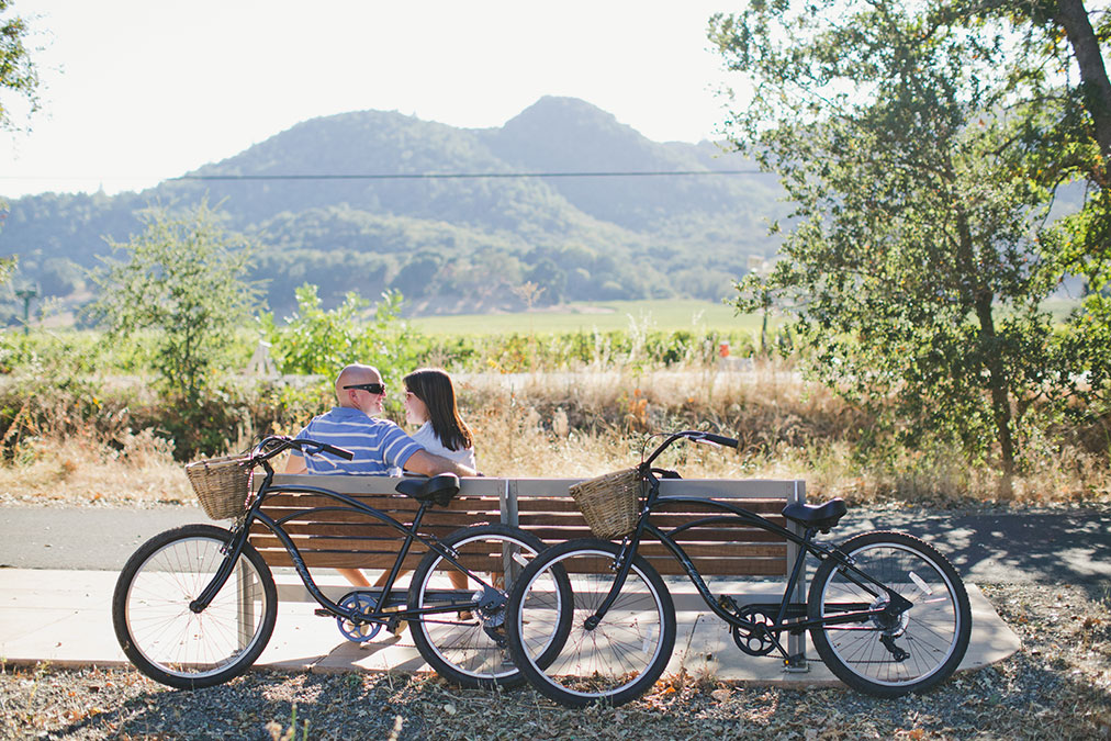couple sitting long the Napa Valley Vine Trail, Napa Valley Bike Tours